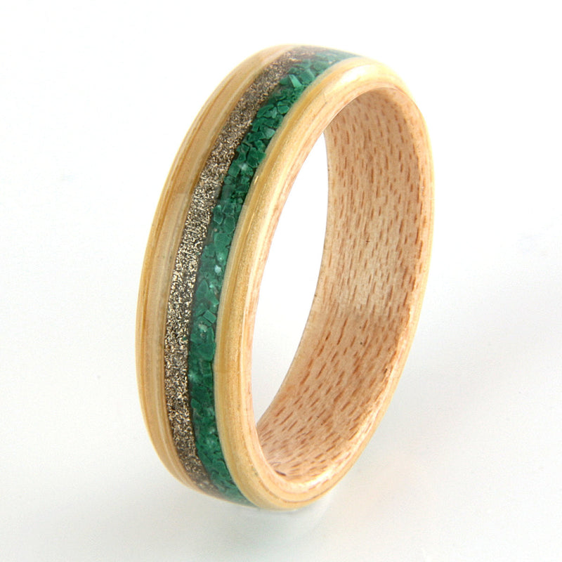 Bamboo ring with two off centre inlays, one of malachite and the other of gold shavings | 5mm wide | by Eco Wood Rings