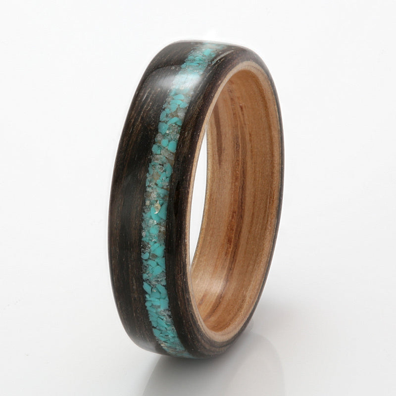 Bogwood bentwood ring with an oak liner and an off centre inlay of mixed turquoise and quartz | 5mm wide | by Eco Wood Rings