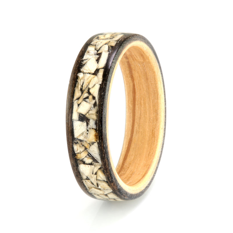 Alternative engagement ring made from materials with meaning | Bogwood outer with oak liner and centred inlay of pine pieces