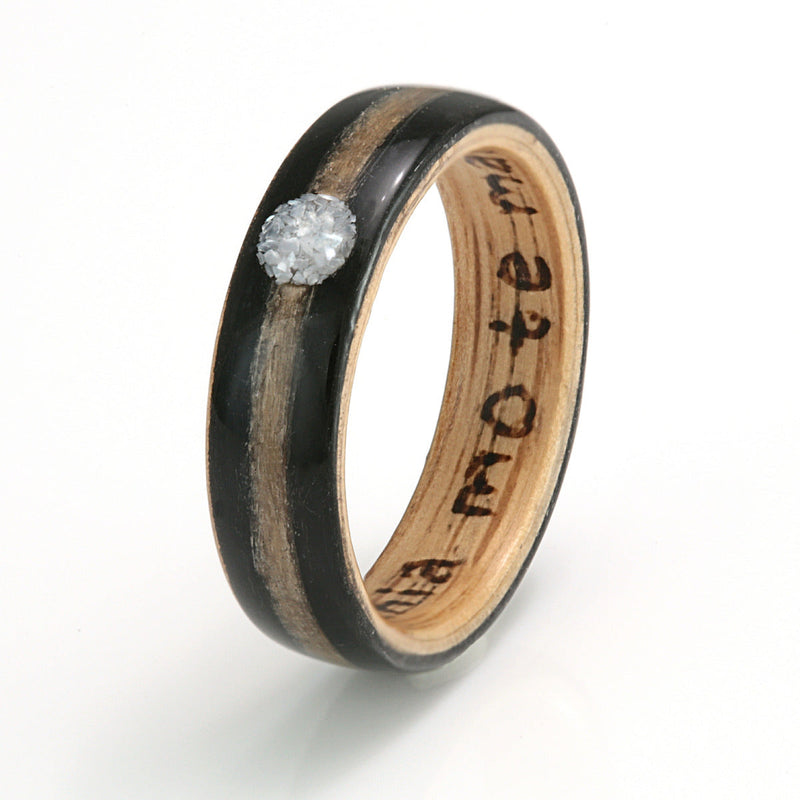 Personalised ring | Bogwood bentwood ring with an oak liner and an inlay of hair meeting at a circle of mother of pearl