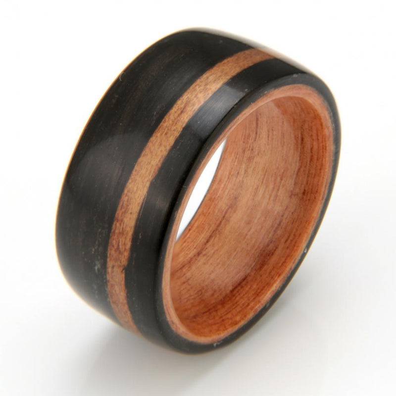Wide wedding ring | Bogwood ring with a liner and off-centre inlay of kauri wood | 9.5mm wide | by Eco Wood Rings