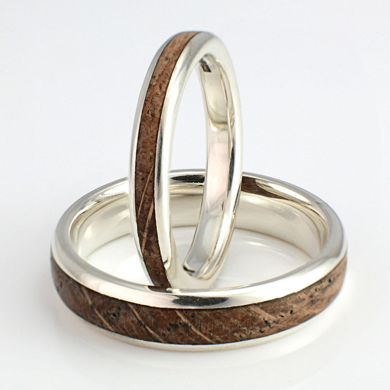 His & hers wedding ring set | 9ct white gold rings with inlays of oak | 5mm and 3mm wide | Rounded edges | by Eco Wood Rings