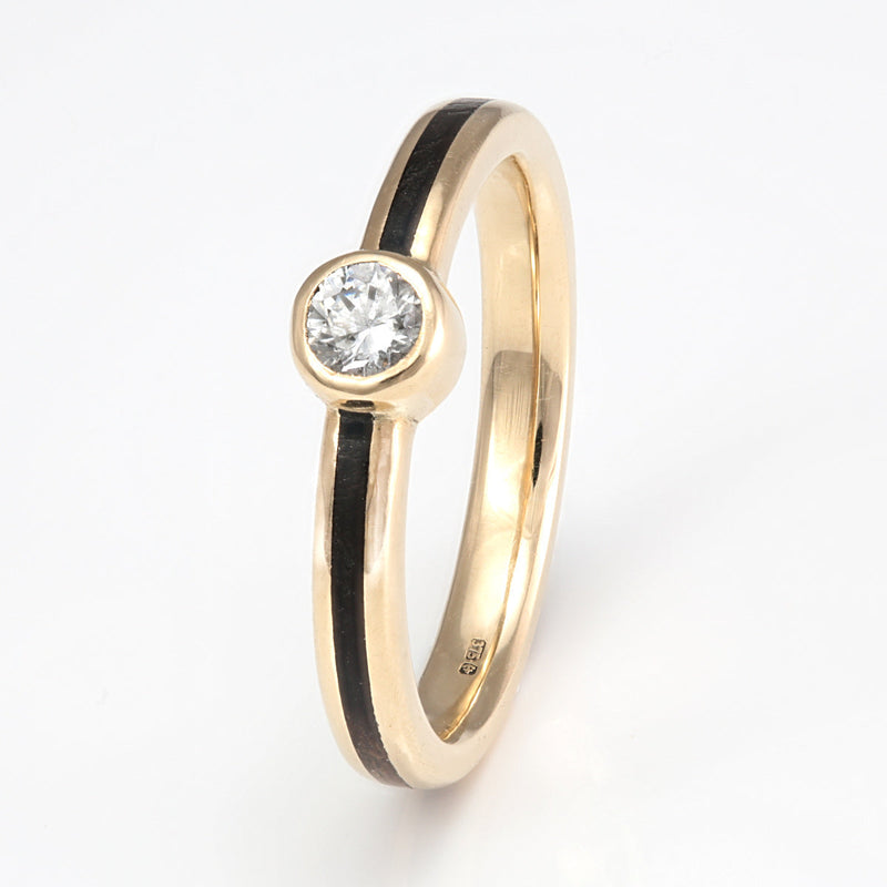 Ethical diamond engagement ring | 9ct yellow gold ring with laburnum wood inlay meeting at a diamond in bezel setting