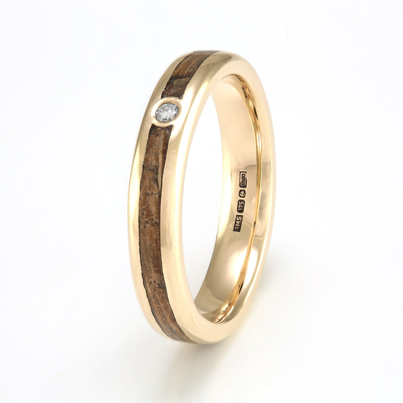 Ethical diamond engagement ring | 9ct yellow gold rounded edge ring with an oak inlay meeting at a traceable white diamond