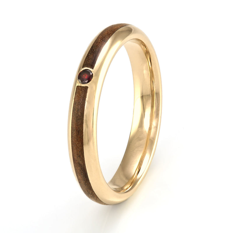 Non traditional engagement ring | 9ct yellow gold rounded edge ring with a centred olive wood inlay meeting at a red garnet