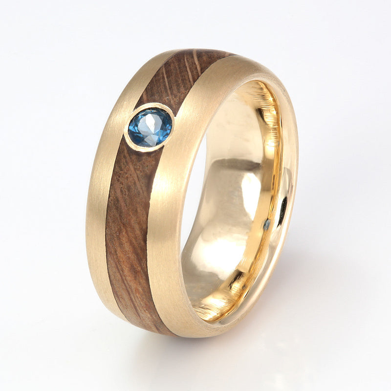 9ct yellow gold engagement ring with centred inlay of oak meeting at a sapphire | 7mm wide | Rounded edge | Eco Wood Rings UK