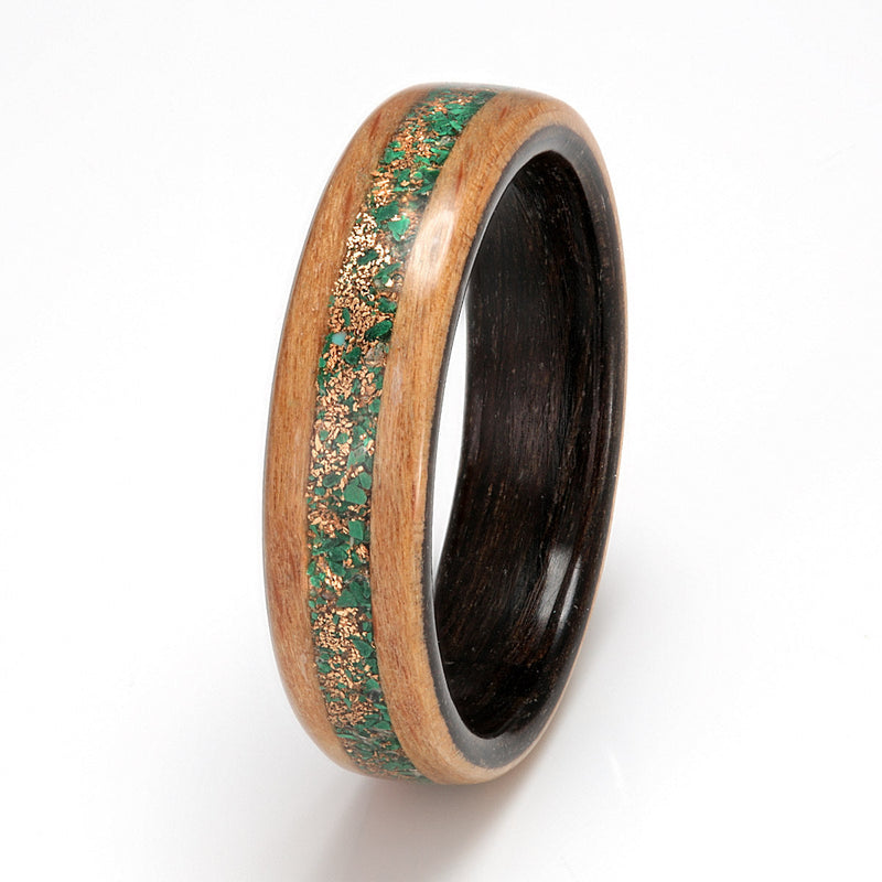 Beech wood ring with a dark bogwood liner and a centred inlay of mixed of malachite, moonstone and gold shavings