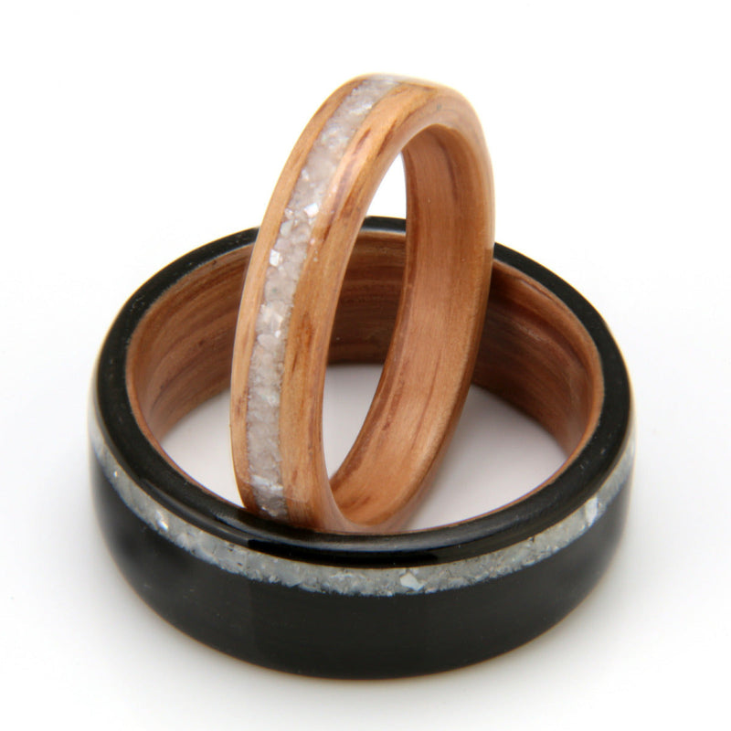 His & hers ethical wedding ring set | Bogwood ring and oak ring, each with an inlay of mother of pearl | by Eco Wood Rings UK