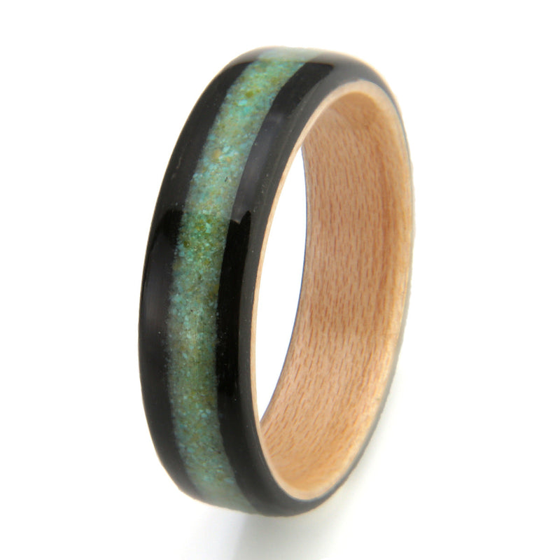 Ethical wedding ring made from bogwood with a maple liner and a centred inlay of mixed turquoise and unakite | 5mm wide