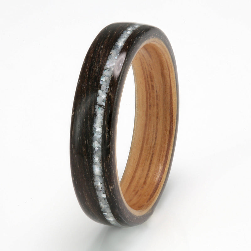 Bogwood bentwood ring with an oak liner and an off centre inlay of mother of pearl | 5mm wide | by Eco Wood Rings UK