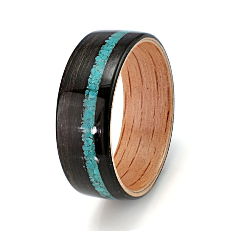 Alternative wedding ring for men | Bogwood ring with an oak liner and an off centre inlay of turquoise | by Eco Wood Rings UK
