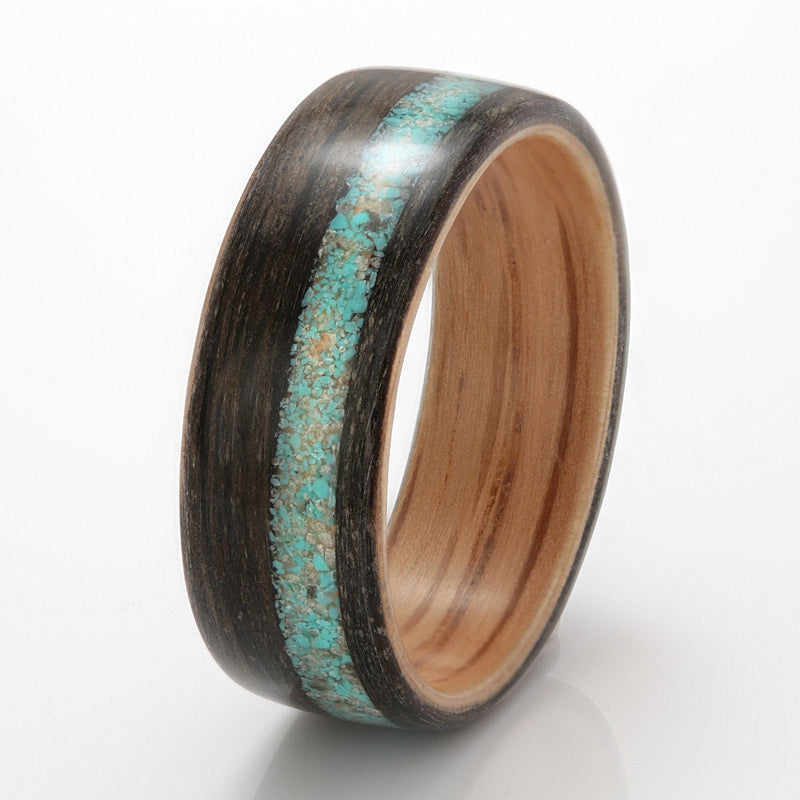 Wooden ring for men | Bogwood ring with an oak liner and an off centre inlay of mixed turquoise and quartz