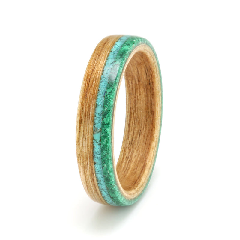 Earth, sky and sea ring | Cherry wood ring with off centre inlays of turquoise and malachite | by Eco Wood Rings UK