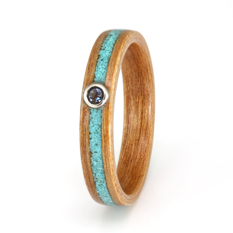 Birthstone engagement ring | Cherry wood ring with a centred inlay of turquoise meeting a round aquamarine stone in bezel