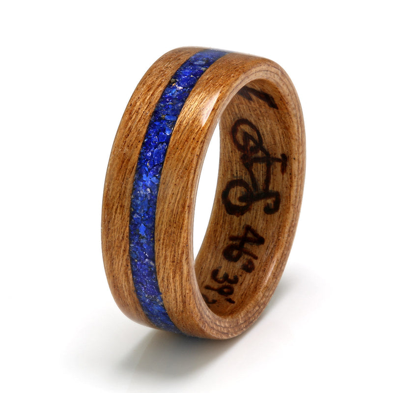 Engagement ring with meaning | Cherry wood ring with a centred inlay of lapis lazuli and wood burned inscriptions inside