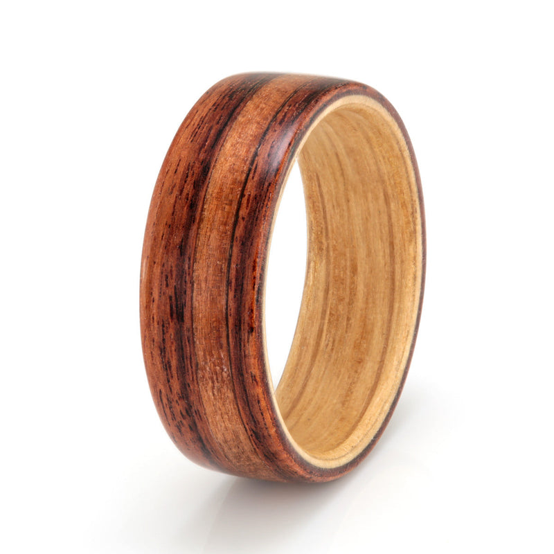 Simple wedding ring design | 7mm wide cocobolo wood ring with a 2mm wide off centre redwood inlay and an oak liner