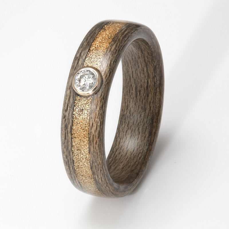 Non traditional engagement ring | Greyed maple wooden ring with an inlay of gold shavings and a diamond | by Eco Wood Rings