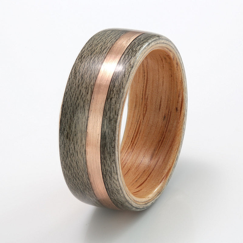 Wide wedding ring | 8mm wide greyed maple wooden ring with an oak liner and a 2mm wide off centre inlay of rose gold