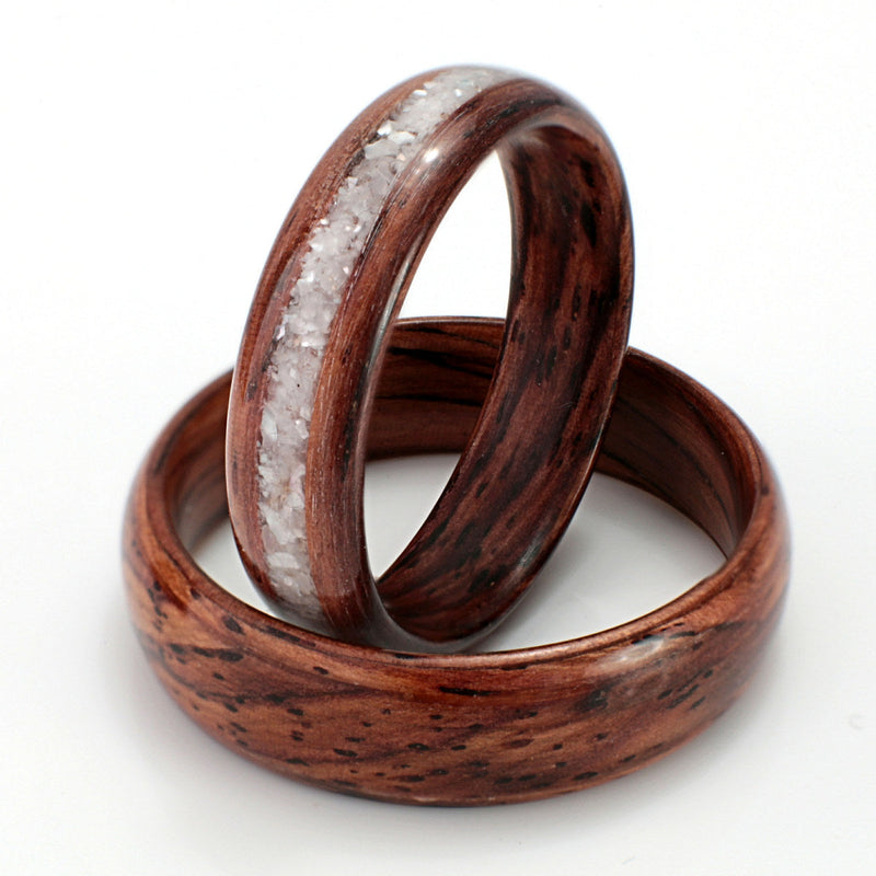 Unique wedding ring set | Two Honduras rosewood rings, one with a centred inlay of mother of pearl | by Eco Wood Rings UK