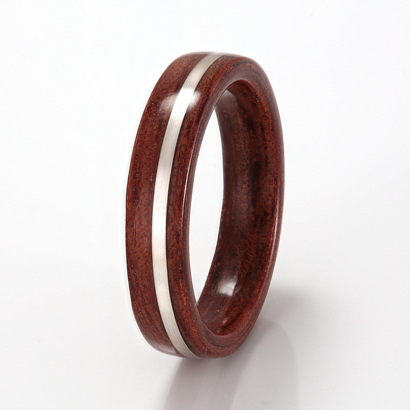 Australian wood ring | 4mm wide jarrah wood ring with a 1mm wide off centre inlay of silver | by Eco Wood Rings
