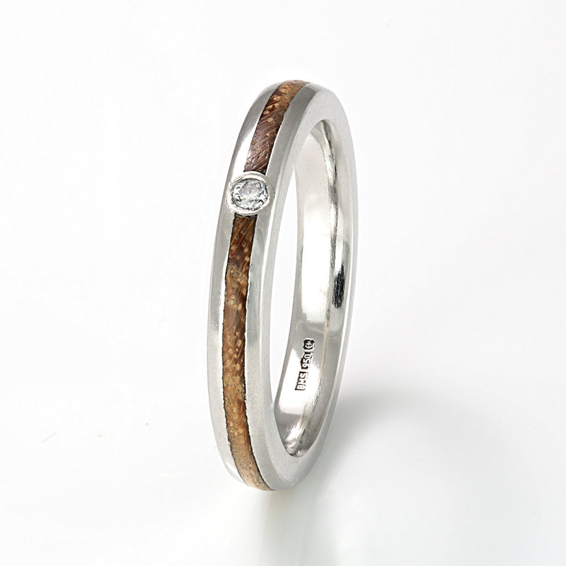 Platinum ethical engagement ring with diamond | 3mm wide rounded edge ring with 1mm wide centred wood inlay and a diamond
